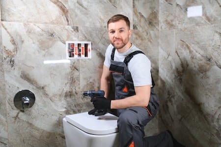 plumber-installing-toilet-in-restroom-2025-03-16-05-18-26-utc (3).jpg